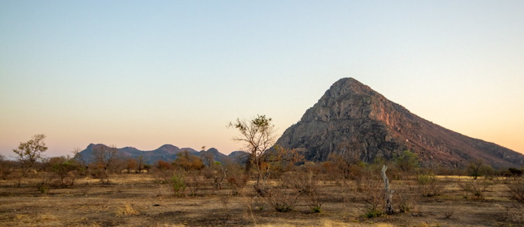 Tsodilo Hills Botswana UNESCO 4500 San Bushmen rock paintings 24000 years old helicopter Maun
