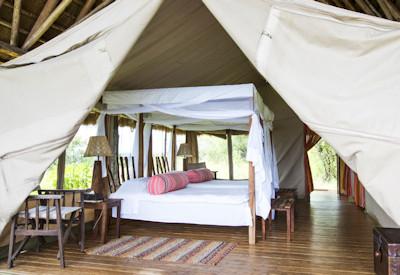 Tented safari suites with mosquito netting
